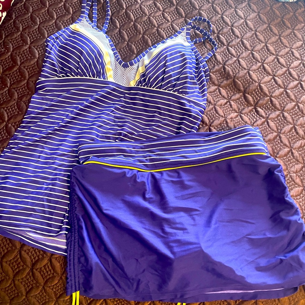 Athleta swimsuit and matching t-shirt cover up.